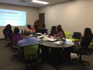Legal advocate Marina Kurakin training 2017 summer interns about Medicaid